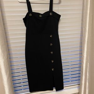 Black knee length dress with buttons. Size large fits more like a medium (6-8)